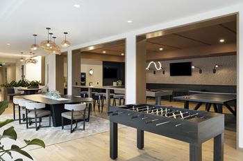 Game Lounge with billiards, ping pong, foosball, and shuffleboard at The Mera in St. Louis Park, 55426